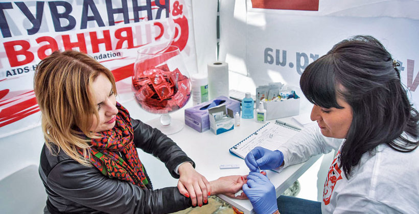 Photo of a woman undergoing HIV testing in Kyiv